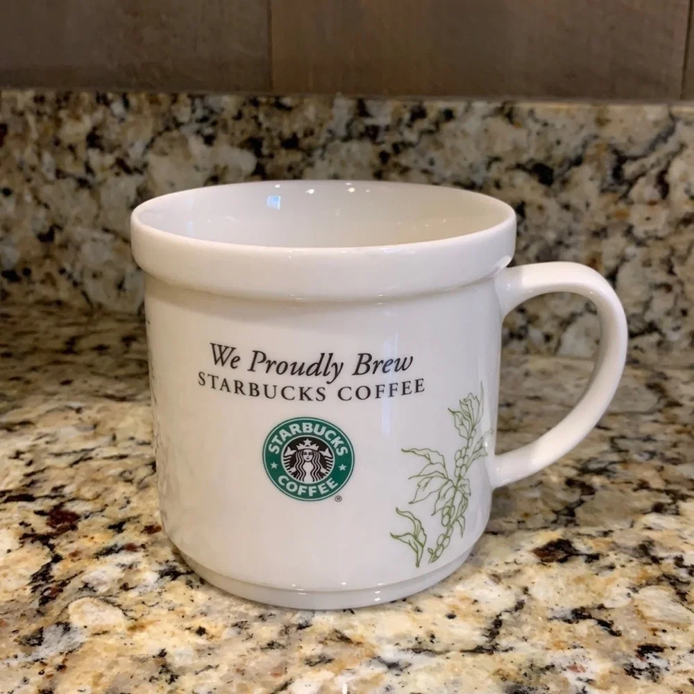 We Proudly Brew Starbucks coffee mug 12 ounces White and green